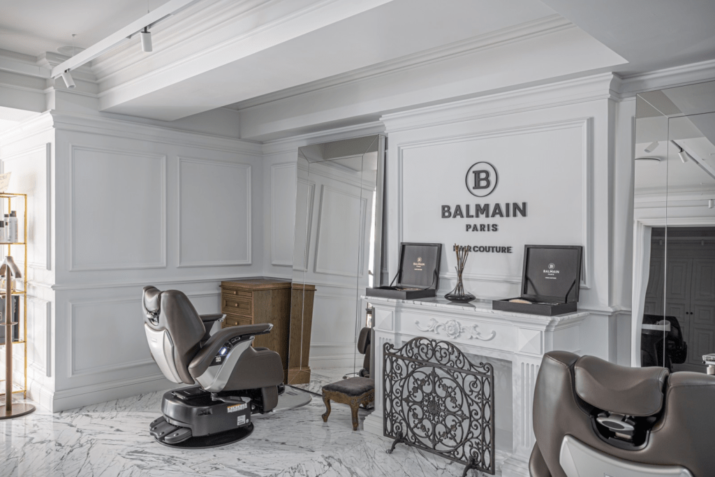 Elegant white-paneled salon suite interior at Aura Beauty Suites salon suites in Colorado Springs.